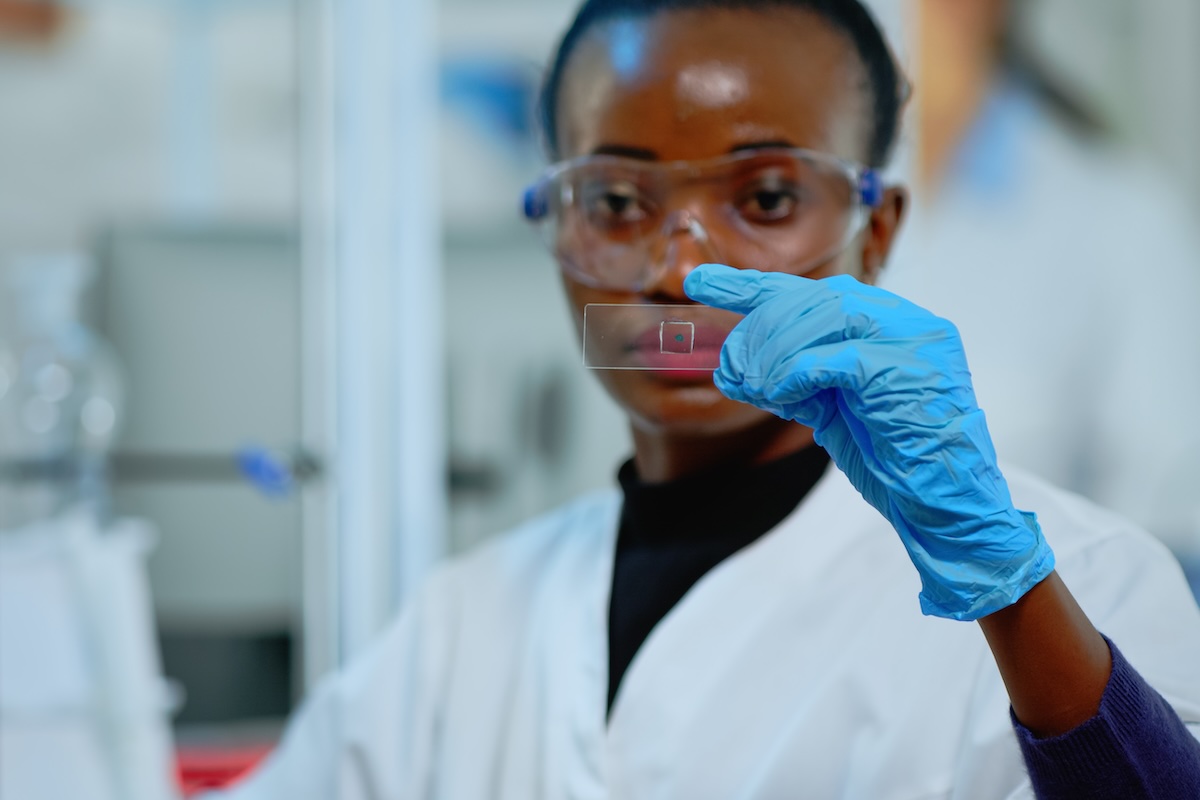 African American technician working on experiment